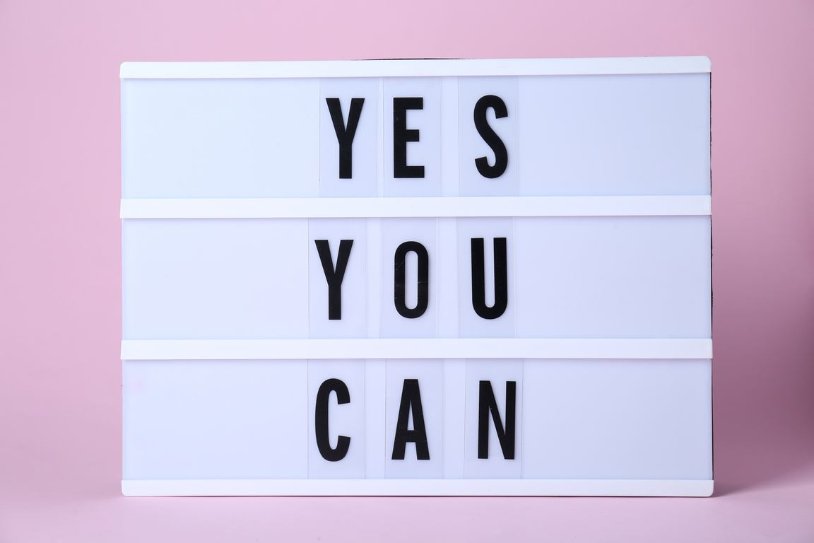Light box sign reading Yes You Can